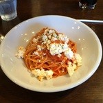 トラットリア クアクア - 自家製リコッタチーズをのっけたトマトソースのスパゲッティ