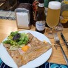 サバラン - ①ハム&削りグリュイエールチーズ&玉子のガレット(税込1,320円)
お酒①ヒューガルデン・ホワイト(瓶ビール、ベルギー)(税込605円)
料理&お酒のセット割り《▲税込110円》で会計は1,815円