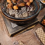 焼肉 炭屋 - 焼肉中のお肉