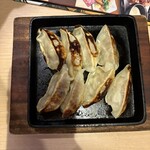 魚民 - 鉄鍋餃子(税込658円)