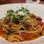 イル・キャンティ  - 豚と豆苗のトマトソースパスタ 1200円(2026年3月)