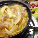 Taishuu Horumon Tatsuya - モツ鍋（後ろは追加のスタミナとキャベツ）