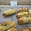 ベーカリー＆サンドイッチカフェ アラタマ - 料理写真:しまうたソーセージ