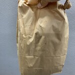 青木屋 - ずっしり重いコッペパン4個入りの紙袋　