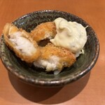 たぬき - お通しは白身魚のフライ