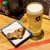 まるまさ家 - ドリンク写真:とりあえず生ビールと豚バラ。赤い紙は飲み放題イベント参加の証(リストバンド)