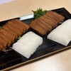 まん八