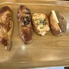ブーランジェリー ミヤナガ - 今回購入したパン　左より　ハニーゴルゴン　豚肉のリエット＆コンフィ　ガーリック風海老のポテトアメリケーヌソース　国産蒸し栗