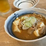 磯丸水産 - もつ煮込み　548円（税込）