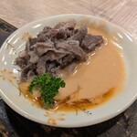 和風もつ料理 あらた - 生せんまい ... 胡麻ダレでいただきます