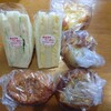 手作りパン キムラヤベーカリー - 左上から、ポテトサラダサンド、たまごサンド、チーズパン、ずんだあんぱん、カレーパン、ごぼうサラダパン