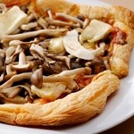Plenty of mushroom and anchovy pie pizza