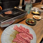 ホルモン湯田のじゃん横 - 天肉にさっぱりしたオリジナルのタレにレモンスライスの果汁を入れて食べました