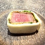 357105592 - 【 黒毛和牛のフィレカツロール 】