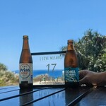 ハリーズ シュリンプ トラック - 順番待ちプレートもオシャレ。イートインスペースでから見える海♡ご一緒様は、ハワイのコナビールと、オリオンドラフト。