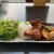 Kisaki CAFE MIYANOSHITA - 料理写真:自家製チキンカレー。彩りの良い盛り付けで見た目も華やかな一皿です。