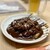 金の字 - 料理写真:もつカレー串（¥210税込）×5本
和風醤油ベースのビターなカレーがウマいっ！
この苦味とコクはカレー粉をしっかりローストすることで出るんだそうです♪ 肝心のもつも臭みなど皆無、柔らか〜い♡