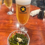 オストラ デ オーレ - サッポロ黒ラベル¥825   お通し(三陸産わかめ) ¥550