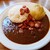 Komi'z - 料理写真:丸ごと玉ねぎカレー(揚げウインナーをトッピング)