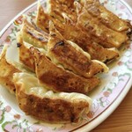 餃子の王将 - 料理写真:餃子(よく焼き)、写真は2人前