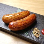 国産ソーセージの藁焼き