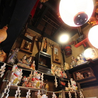 Numerous antiques reaching up to the ceiling