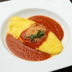 Cheese omelet with tomato cream sauce