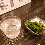 大起 - 芋焼酎『心ゆくまで』(400円)、お通しの菜の花おひたし(300円ぐらい)