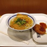 つるまる - 料理写真:毎月3日はきつねうどん半額。コロッケ