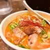 鶏の穴 - うま辛トマト(1,100円)＋大盛り(100円)