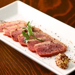 Roasted duck with pepper as an appetizer