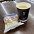 LAWSON - 料理写真:丸中ミルクドーナツ108円、ホットコーヒーS160円