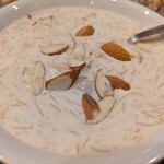 ナワブ - 2026.06・Kheer(サービス)、甘さ控えめ、上品なグリーンカルダモンの風味、香ばしいナッツに爽やかなドライフルーツ、僕にも美味しいキール