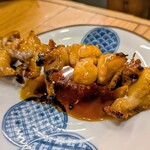 串屋横丁 - 大トロBIGホルモン赤ダレ320円