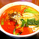 Bokkakyo - 自家製練り胡麻担々麺のこの2色のスープの表面が強烈！