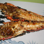 磯料理 ゑび満 - 伊勢海老鬼瓦焼き　50年継ぎ足しの秘伝のタレを使用しています。