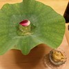 よこい - 梅雨どきの、雨雫に見立てた素敵な一品目。トマトジュレ美味です。ひと口愉しんだ後、雲丹、じゅんさい、マスカットの小鉢をジュレにのせ違う味わいを。