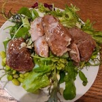 MORETHAN TAPAS LOUNGE - This is the salad and roasted pork that my partner got. The salad has plenty of arugula, which is my favorite.