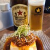 立ち飲み広島 - お料理①台湾冷奴(税込382円)
絹豆腐に肉味噌&食べる辣油&刻み青葱&白胡麻載せ、濃いめの味わいでお酒のアテにピッタリ
お酒①サッポロラガービール赤星(瓶ビール、サッポロビール)(税込867円)