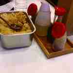 うどん 丸香 - 薬味も色々あるものだなぁと思いながら席へとつき