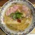麺屋 こくう - 料理写真:塩らぁ麺1,250円。具材は大ぶりで厚さもある豚ロースのレアチャーシュー、大山鶏もも肉、姫三つ葉、紫玉ねぎの荒微塵切り、ドライトマト、アサリのペースト状のもの。彩鮮やかです。