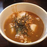 麺座 かたぶつ - 辛つけ麺のつけ汁で、トック雑炊