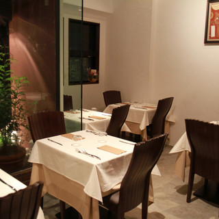 Relax and enjoy authentic Italian Cuisine in a restaurant with calm tones.