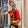 廣島つけ麺本舗 ばくだん屋 - 入口右の人形笑