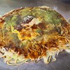 お好み焼 高田 - 肉玉そば【S:3/4玉】(税込800円)
・袋入り蒸し中太麺
・オタフクソース【専門店用】(控えめな甘み)
・焼き方:しっかり押さえる
・焼き上がりの形:やや乱雑な円形
・鉄板orお皿で食べるのが標準
