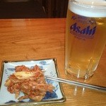 居酒屋ななちゃん - 2014/07/27 21:00訪問　生ビールにお通しはキムチ