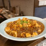 餃子と瓶 - 麻婆豆腐は辛さの調節できます。