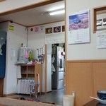 くれちうどん - 座敷席から厨房の出入口の様子