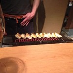 じどりや 穏座 - 手羽先焼いている