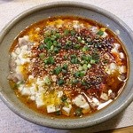 ゆたか - 豆花牛肉　仕上げに煮立った油をドバッとかけます